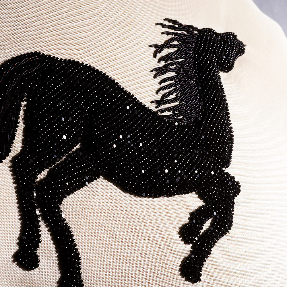 Cheval Bondissant beaded cushion