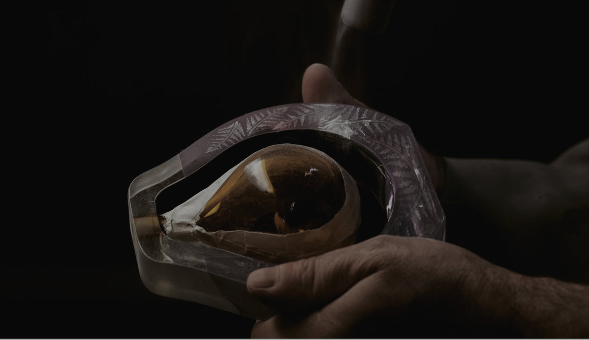 Lalique artisans shaping crystal